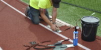 Use a straight edge to trim bad track surface